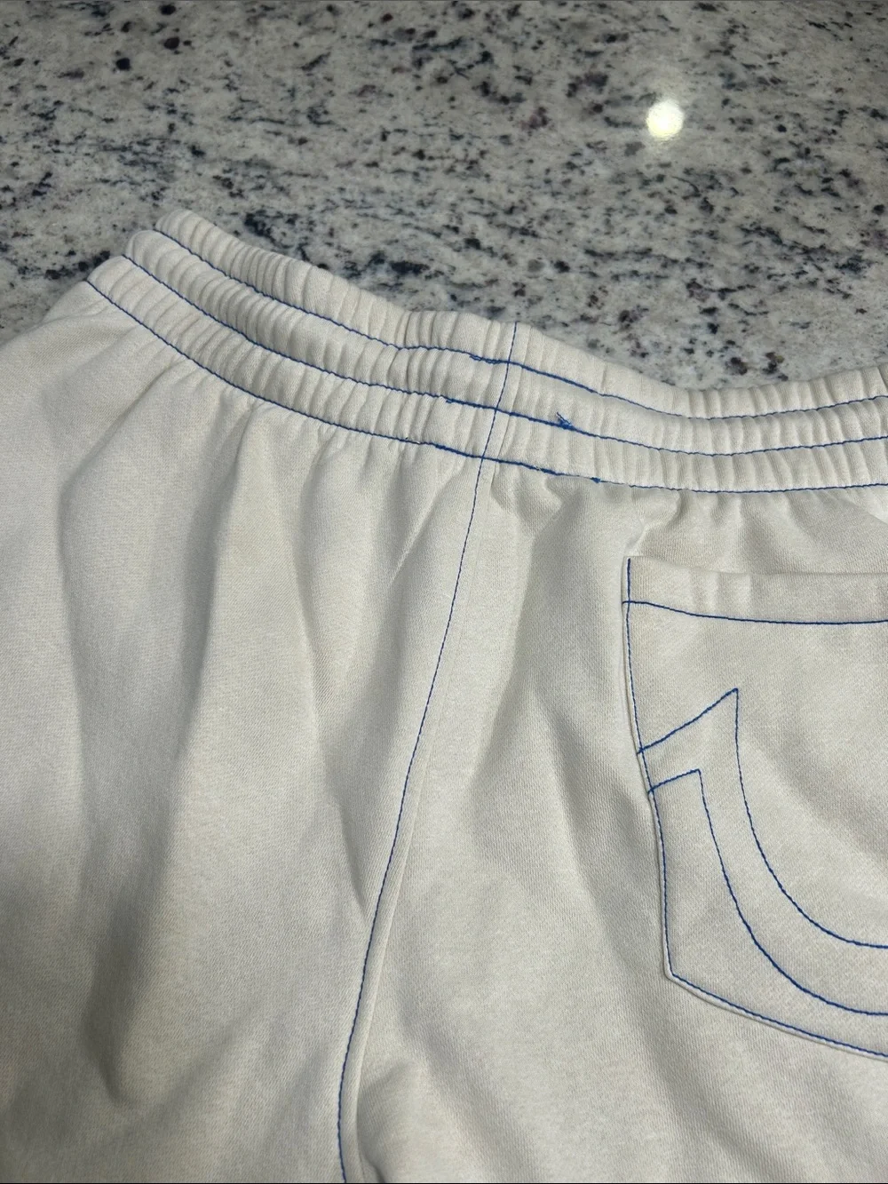 True Religion Cream Shorts with Blue Drawstring and Trim